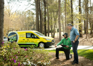 Mosquito Joe technician teaching customer about Mosquito Control treatments